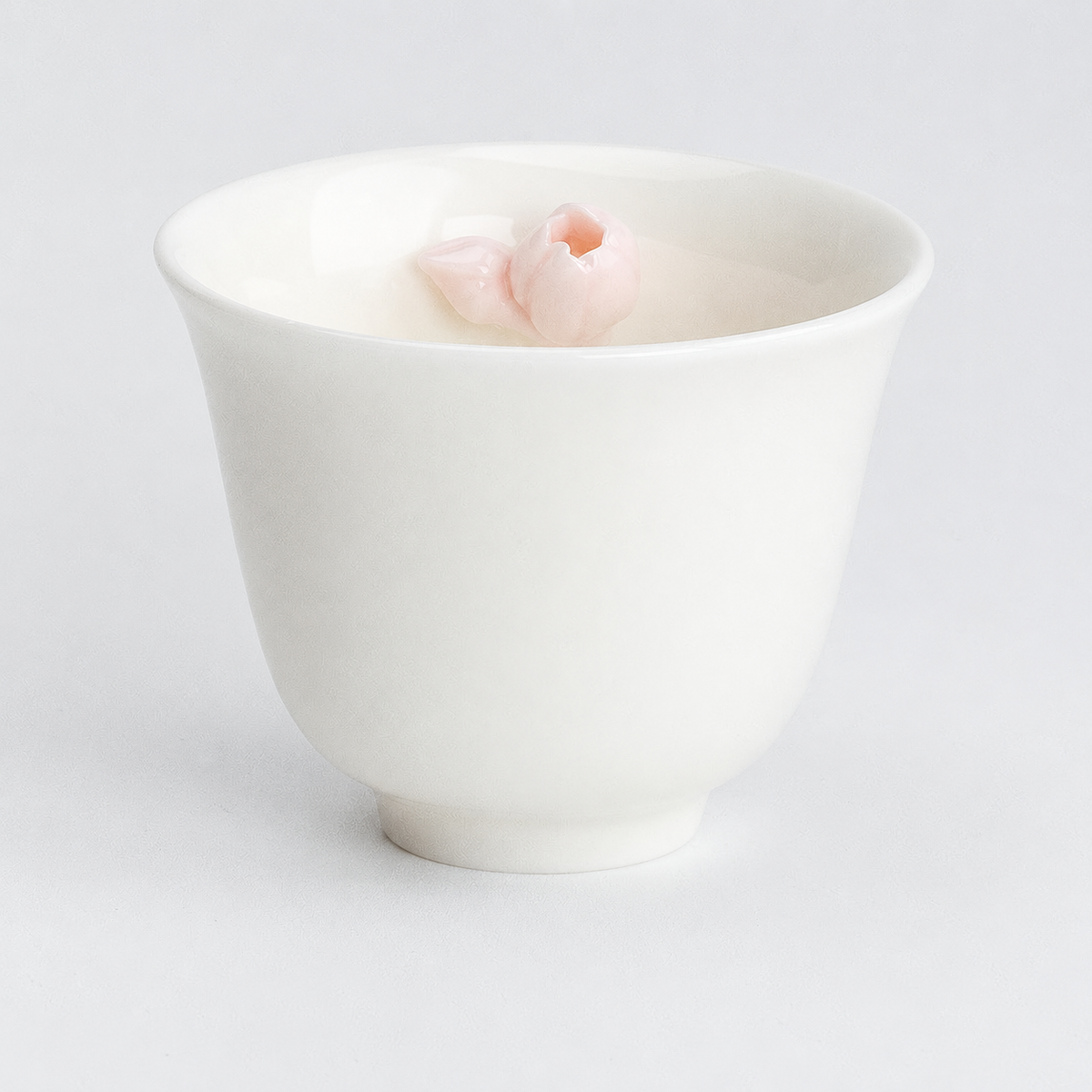 Moon White Magnolia Cup with sculpted pink flower detail inside
